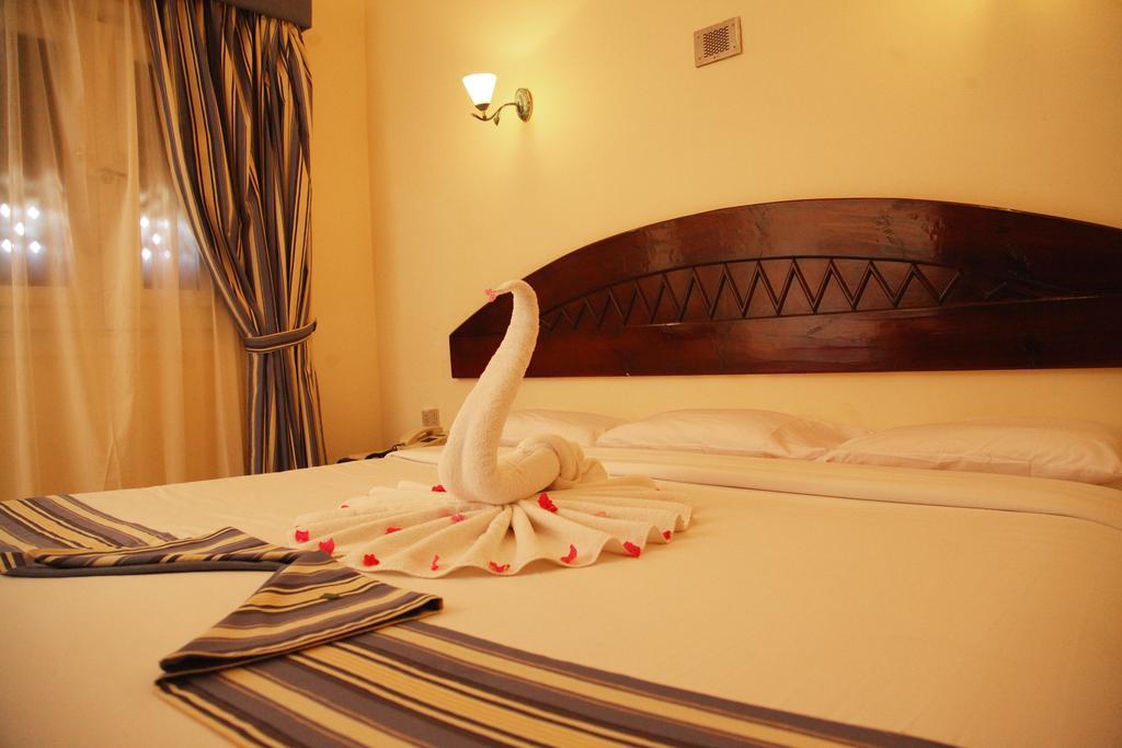 Magawish Swiss Inn Resort Hurghada Bagian luar foto